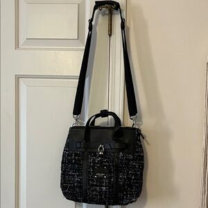 Henri Bendel black and blue jetsetter bag